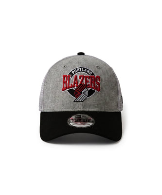 A Portland Blazers 39FIFTY adjustable baseball cap by New Era, featuring a heather gray front panel and black brim, with a red, black, and white embroidered team logo on the front.