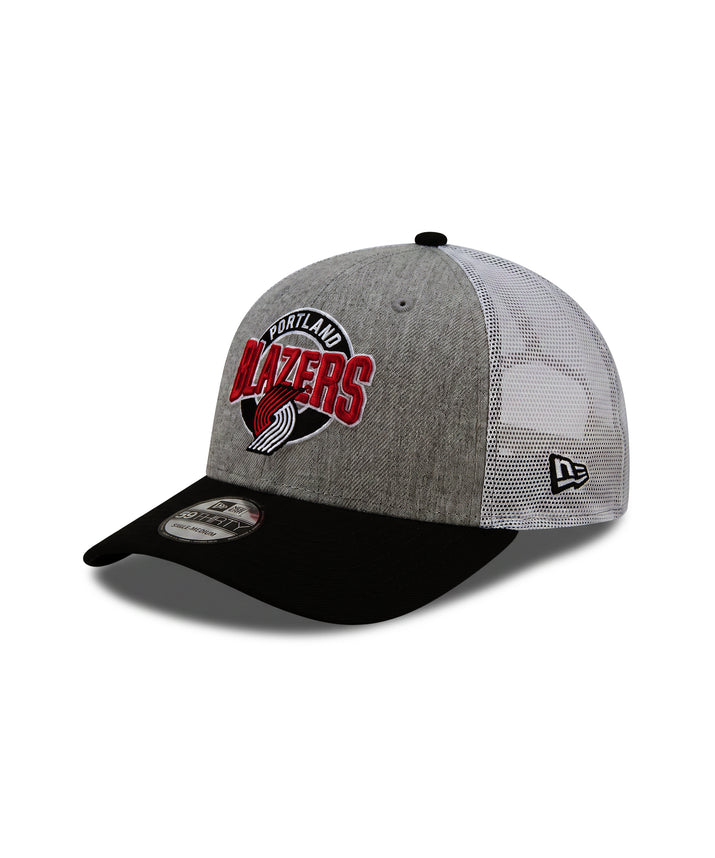 A gray and black trucker hat featuring the Portland Blazers logo on the front and a New Era 9FORTY sticker on the brim, set against a plain white background.