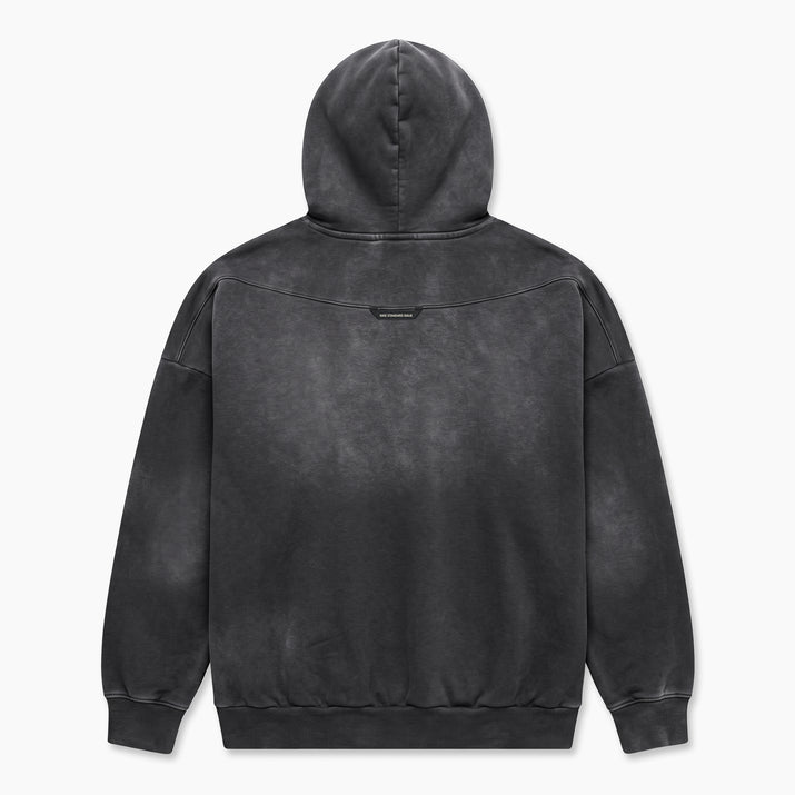 A dark gray washed hooded sweatshirt shown from the back, featuring a faded mineral-wash texture and ribbed cuffs and hem, set against a plain white background.