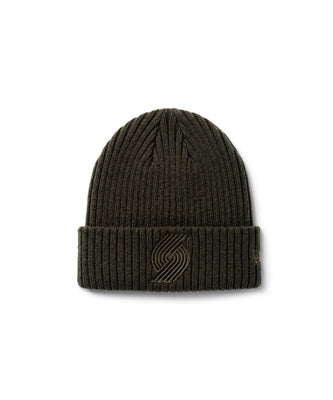 An olive green ribbed knit beanie hat featuring a tonal embroidered logo on the front cuff, set against a plain white background.